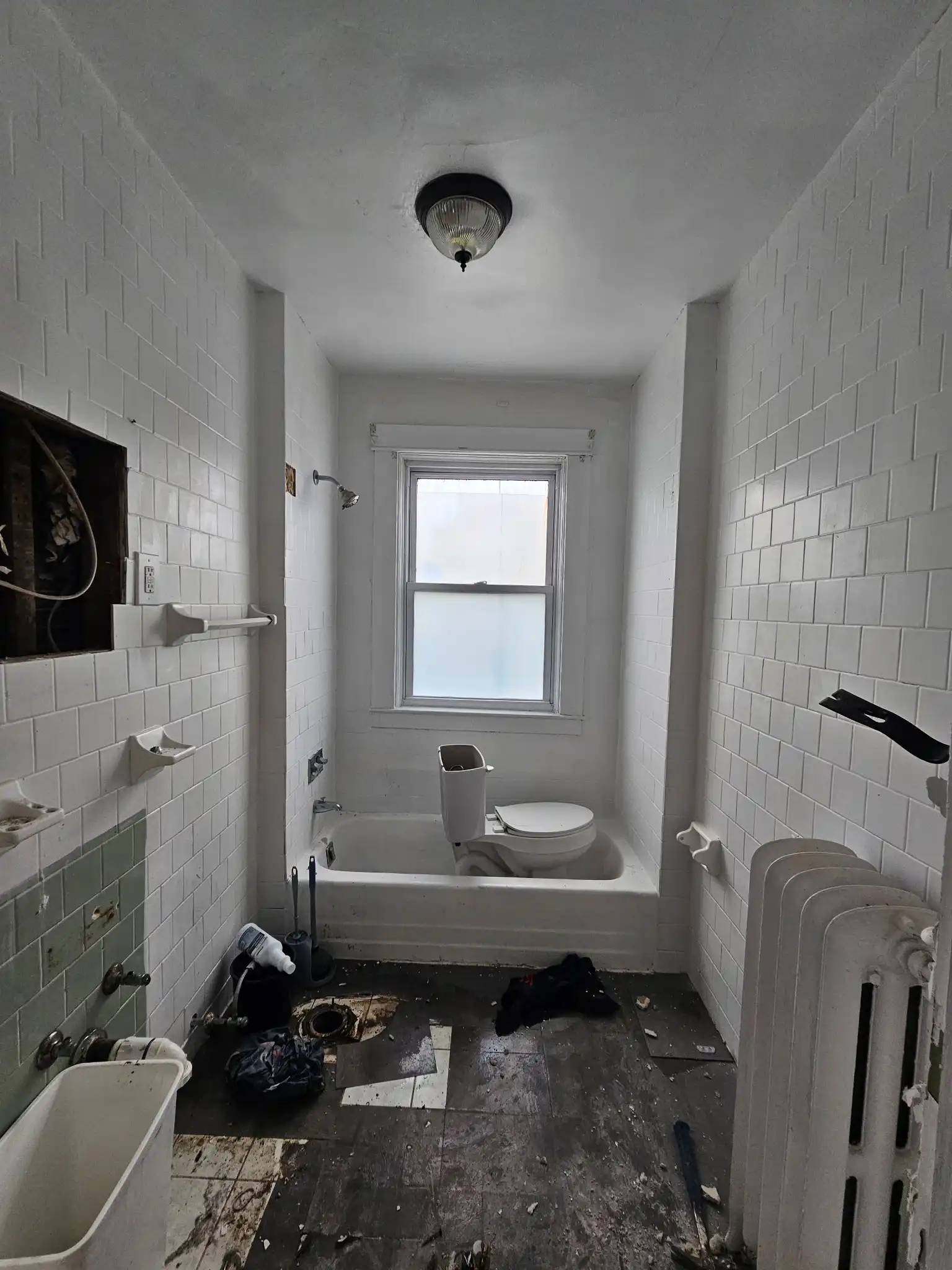 Bathroom before interior demolition in New Bedford MA
