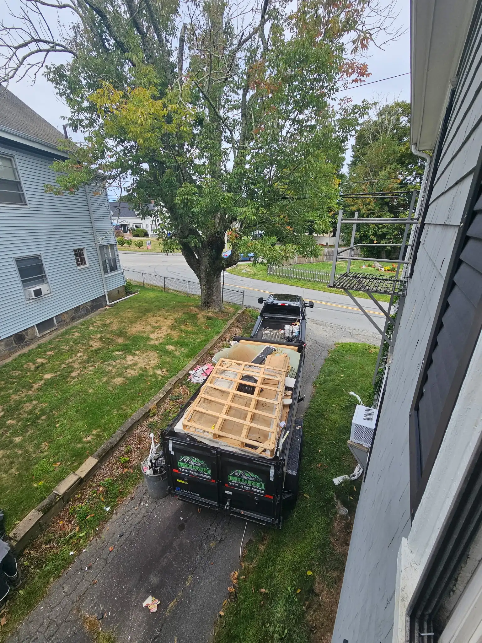 Taking away an old boxspring and other unwanted items